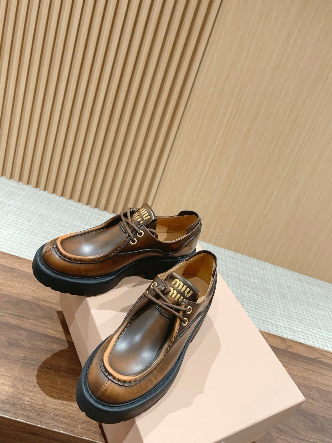 UA Miu Miu Laced Fumé Leather Loafers