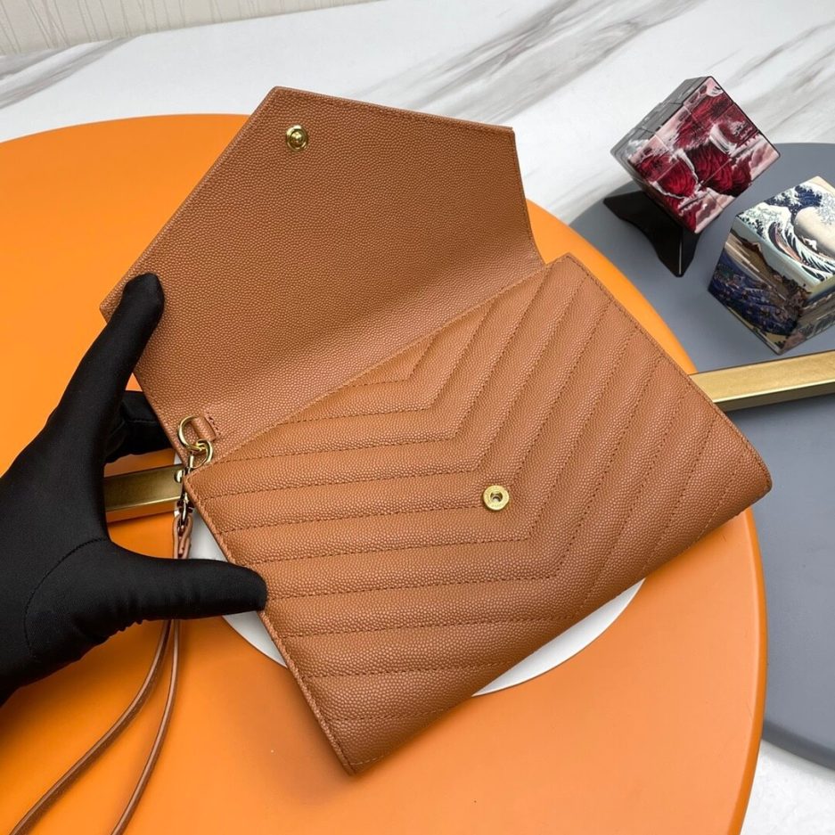 YSL CASSANDRE matelassé leather flap clutch